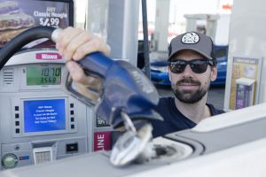 Refueling a boat at a land pump.