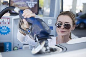 Refueling a boat at a land pump.