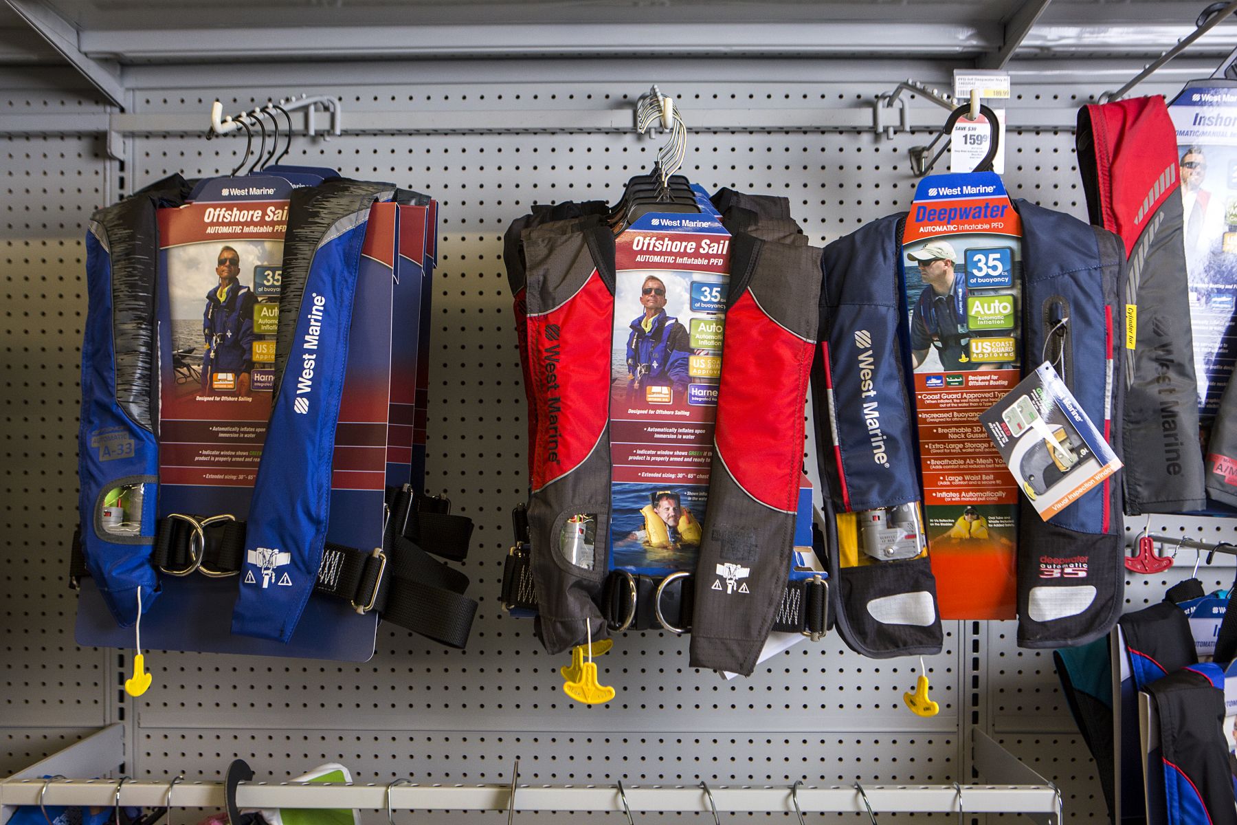 Safety equipment on display at a retail outlet.