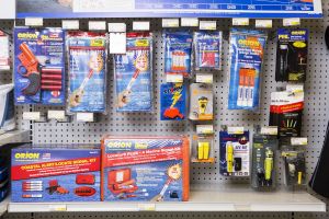 Flares and other safety equipment on the shelves at a retail outlet.