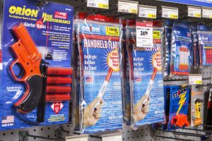 Flares and other safety equipment on the shelves at a retail outlet.