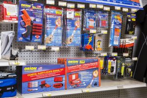 Flares and other safety equipment on the shelves at a retail outlet.