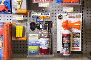 Horns and other safety equipment on the shelves at a retail outlet.