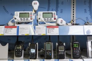 VHF and handheld VHF radios on display at a retail outlet.