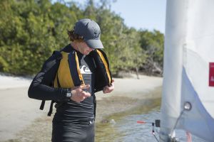Putting on a properly fitting life vest before sailing in the Sand Key inlet in Clearwater Beach.