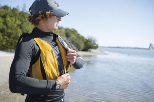 Putting on a properly fitting life vest before sailing in the Sand Key inlet in Clearwater Beach.