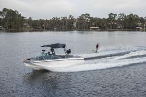 Water skiing behind a water ski boat on Lake Sheen in Orlando, Florida.