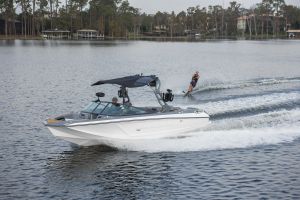 Water skiing behind a water ski boat on Lake Sheen in Orlando, Florida.