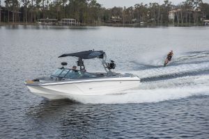 Water skiing behind a water ski boat on Lake Sheen in Orlando, Florida.