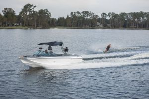 Water skiing behind a water ski boat on Lake Sheen in Orlando, Florida.