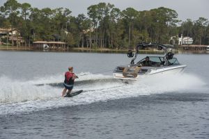 Water skiing behind a water ski boat on Lake Sheen in Orlando, Florida.