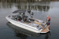 Water skiing behind a water ski boat on Lake Sheen in Orlando, Florida.