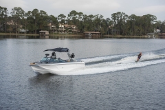 Water skiing behind a water ski boat on Lake Sheen in Orlando, Florida.