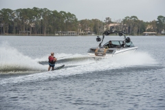 Water skiing behind a water ski boat on Lake Sheen in Orlando, Florida.