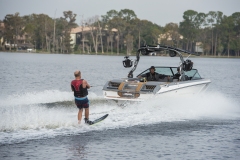 Water skiing behind a water ski boat on Lake Sheen in Orlando, Florida.