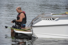 Water skiing behind a water ski boat on Lake Sheen in Orlando, Florida.