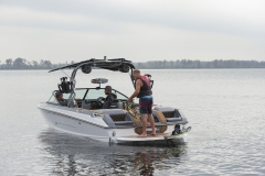 Water skiing behind a water ski boat on Lake Sheen in Orlando, Florida.